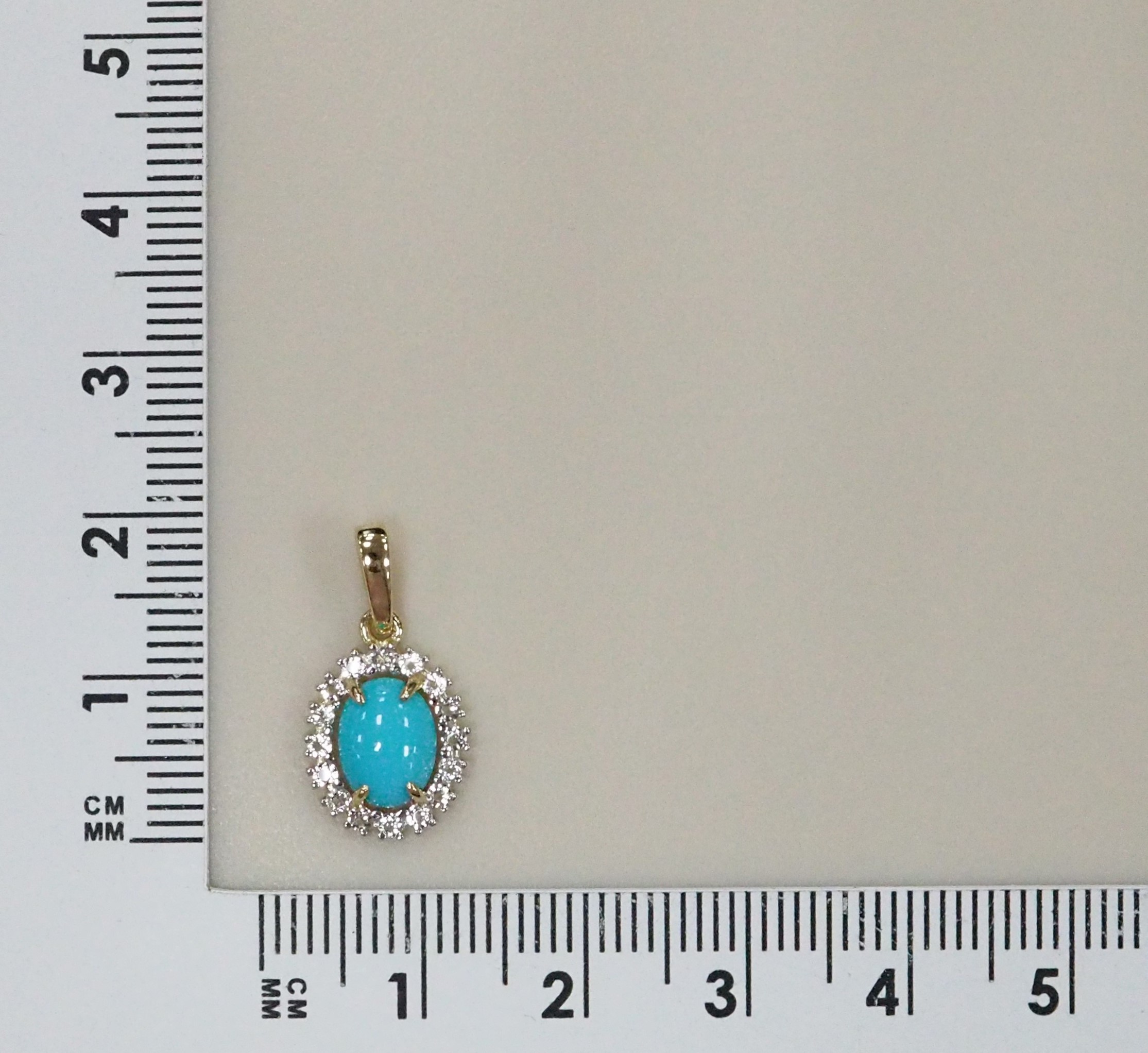 Подвеска из желтого золота с бирюзой